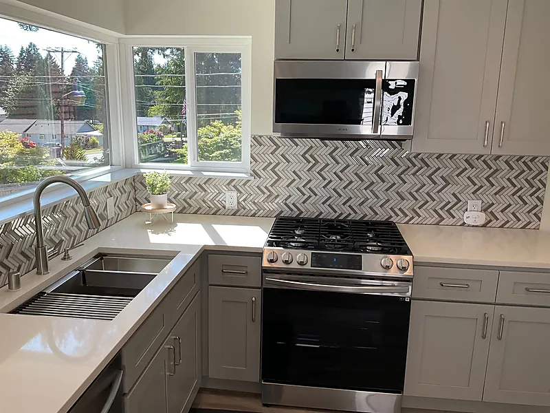 Kitchen by Quality Renovations NW LLC